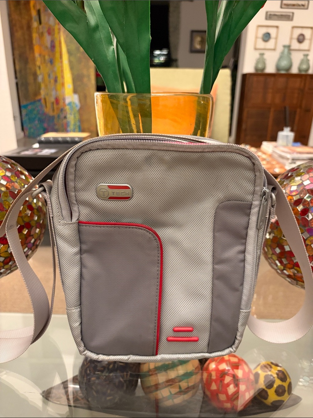 Tumi Gray Crossbody Bag with Red Trim (Unisex bag)